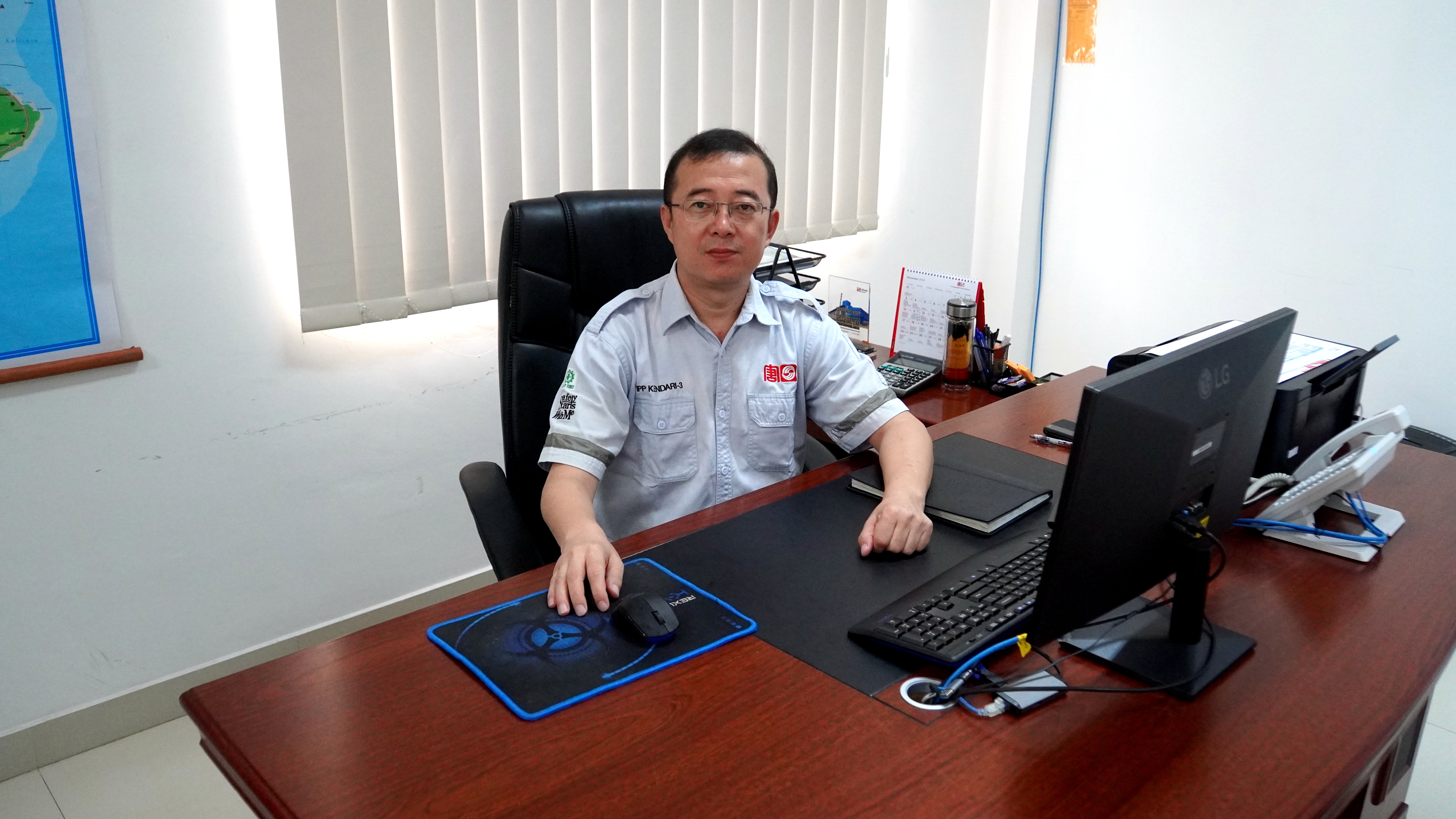 王全民在辦公室.jpg